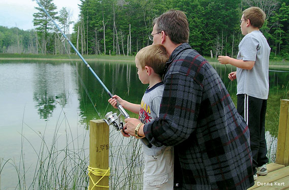 father-sons-fishing-donna-kert-570x375.jpg