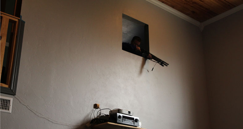 home defender with shotgun