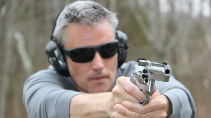 Author shooting modified revolver